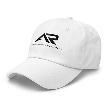 Gorra blanca tipo dad hat con logo AR y texto 'We Are The Vision' en negro al frente