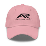 Gorra rosa tipo dad hat con logo AR negro y texto 'We Are The Vision' en el frente